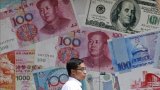 China’s yuan hits 2-year low, Asian currency pressure rises, as US dollar strengthens