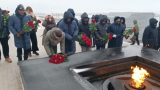 ‘You are not alone’ – African MPs visit Donetsk Saur-Grave memorial