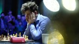 Global chess competition marred by dress code scandals