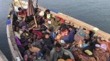 Malaysia doubles patrols to find Myanmar migrant boats after nearly 200 people detained