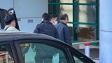 Hong Kong police take away pollster for investigation over aiding absconder