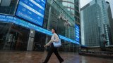 Hong Kong stock market operates as normal during first-ever typhoon trading session