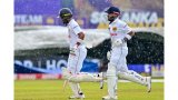 Downpour halts Sri Lanka Test as Australia tighten grip