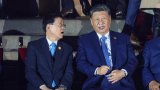 Xi Jinping gives encouragement to Hong Kong leader in talks at Apec summit sidelines