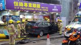 4 injured as car crashes into optical store in Hong Kong