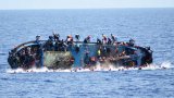 Libya boat capsize: Families search for bodies of loved ones