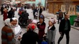 China eases travel curbs on Uyghurs but maintains 'severe' controls: report