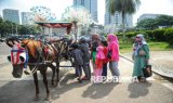 Jelang Malam Pergantian Tahun, Pengunjung Monas Meningkat