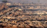 Los Angeles wildfires rage on as National Guard called in